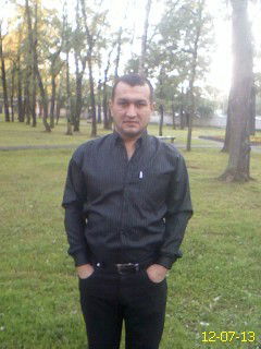 Комил Гиёев