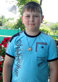 Максим Корман