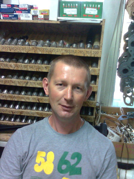 Роман Романец