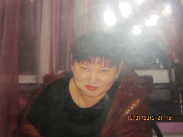 Мира Искакова