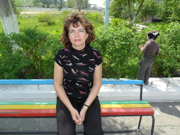 Оля Новокрещенова