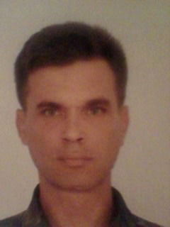 Олег Кузьмичев