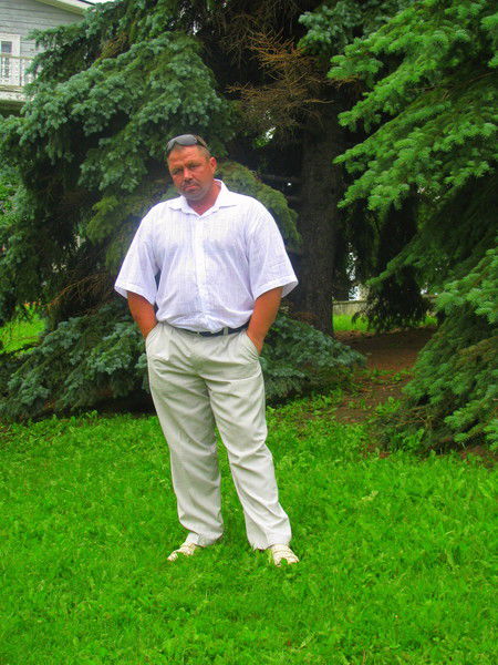 Олег Слугачев