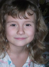 Оля Худякова