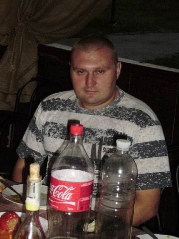 Александр Шкурко