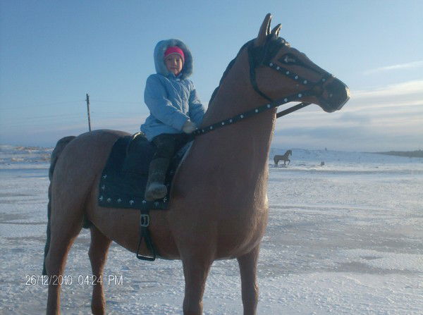 Айгуль Тутешева