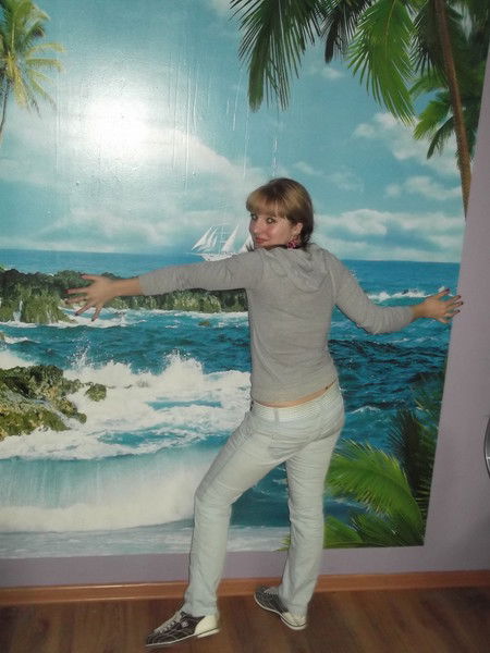 Кэтт Тихомирова