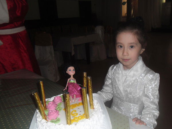 Лаура Олжабаева