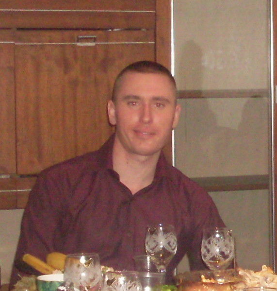 Денис Холуденев