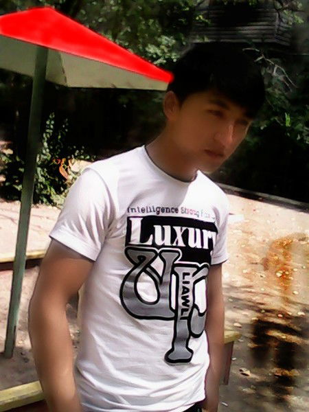 Алишер Садыков