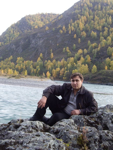 Александр Белан