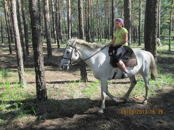 Оля Титкова