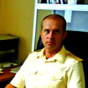 Юрий Серик