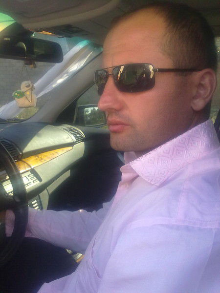 Олим Холинов