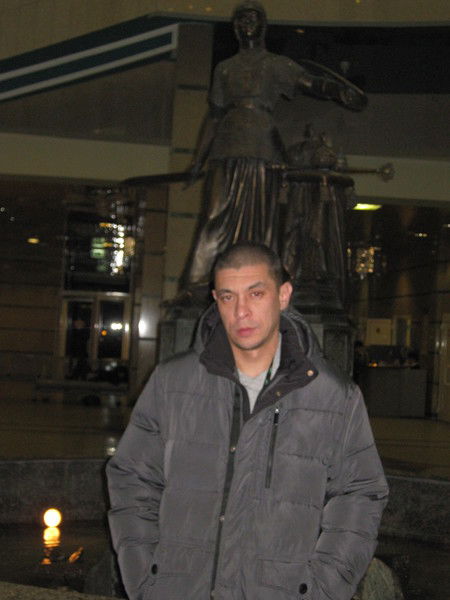 Алишер Топоев