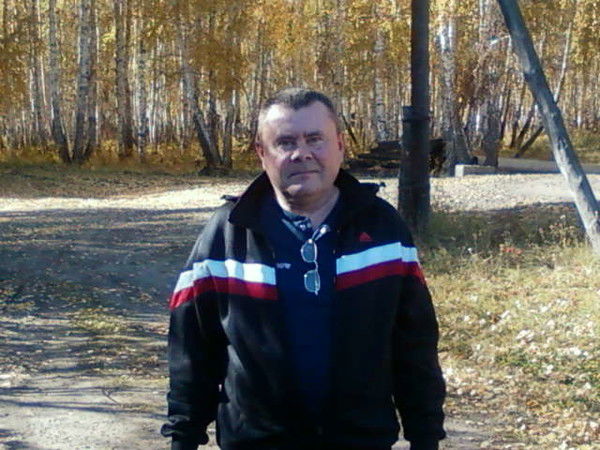 Александр Слаиковскии