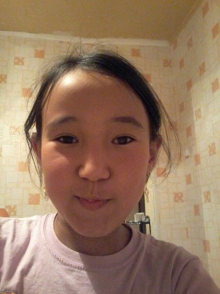 Айжана Кизатова