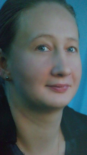 Лариса Щусь