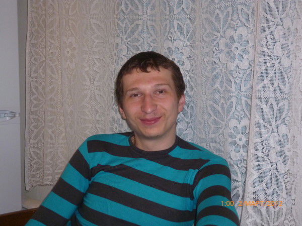 Александр Чаров