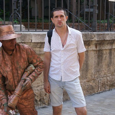 Андрей Брат