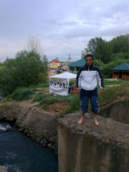 Даурен Исин