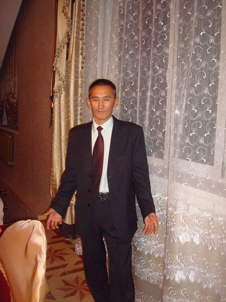 Малик Елупанов