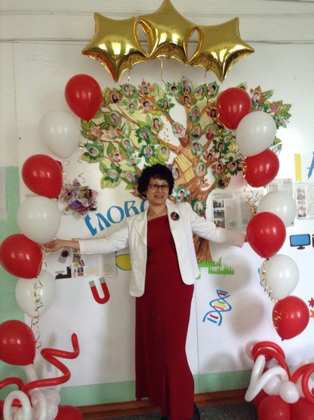 Алма Маженова