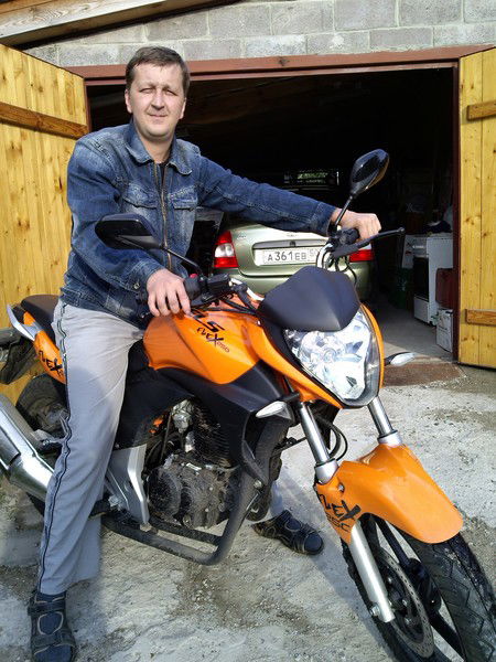 Александр Томников