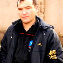 Искандар Холиков