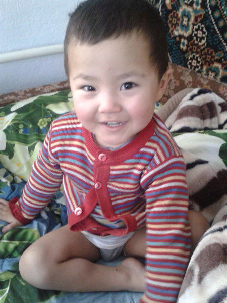 Алишер Шерозов