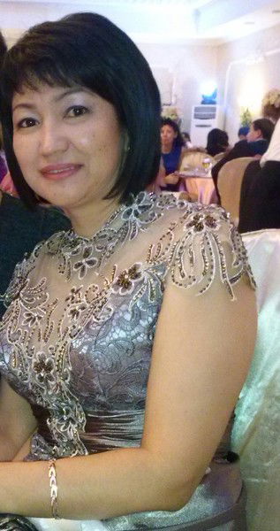 Лаура Успангазиева