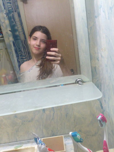 Катя Красная