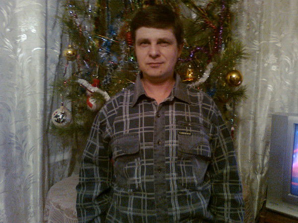 Александр Томилец