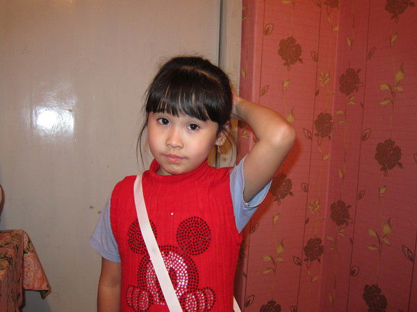 Лаура Жунусова