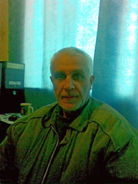 Александр Положий