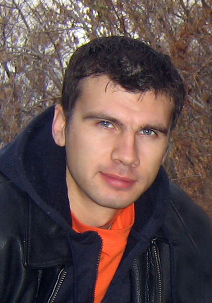 Александр Белан