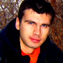 Александр Белан