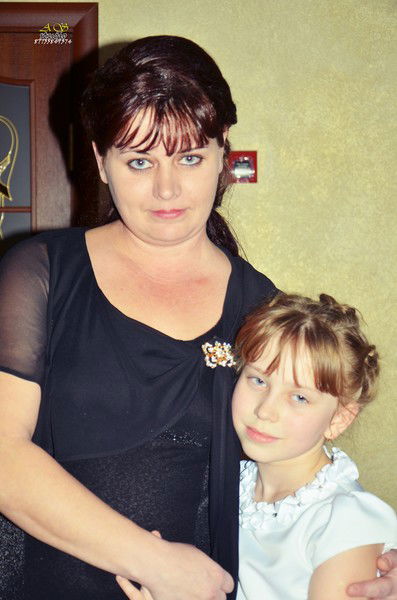 Наташа Позиненко