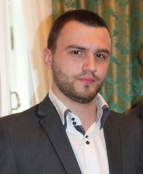 Максим Романов