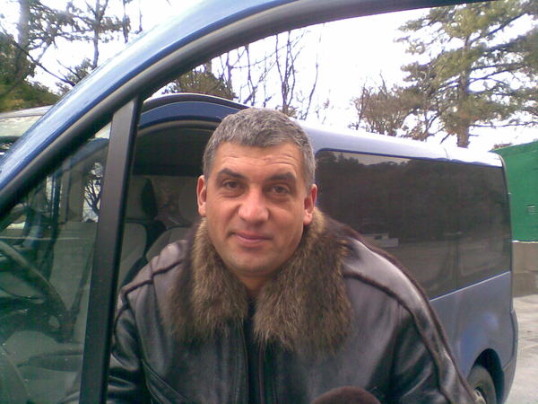 Александр Белан