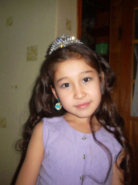 Мадина Кожатаева