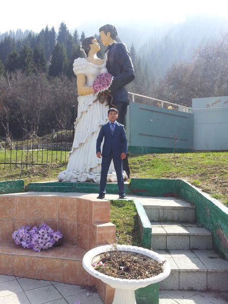 Алишер Табын