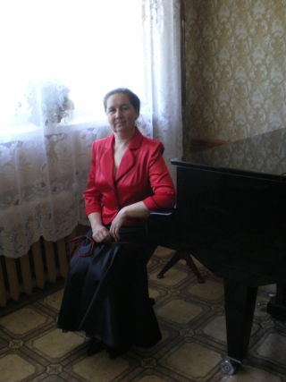 Лариса Опрыщенко