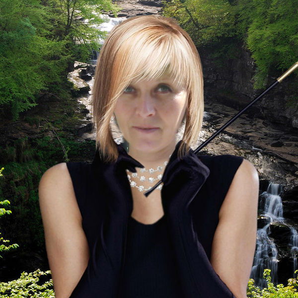 Лора Каминская