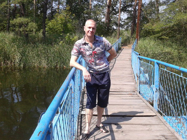 Олег Опрятний