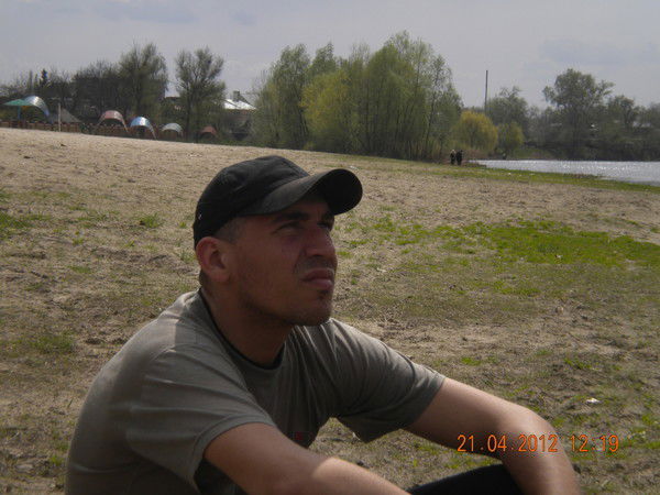 Роман Могильный