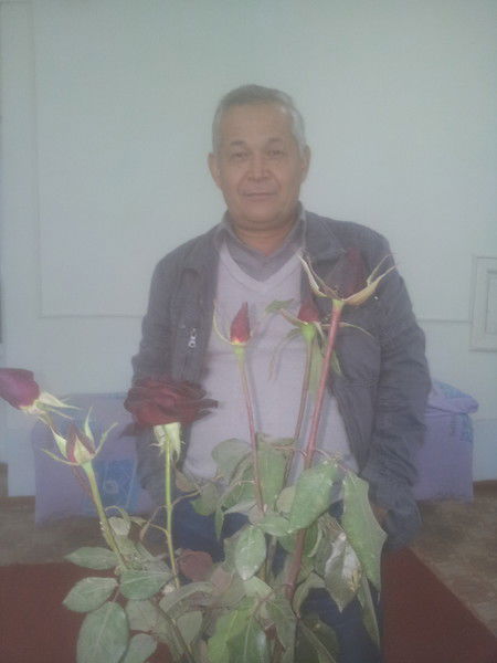 Олим Тогайназаров