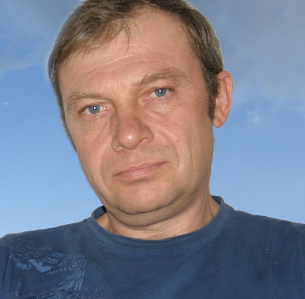 Михаил Томан