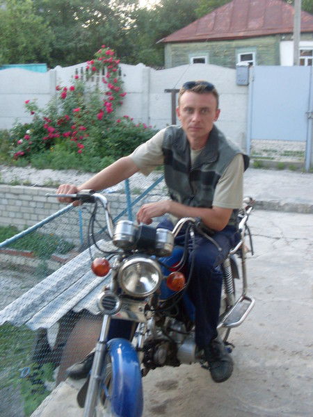 Александр Романенко