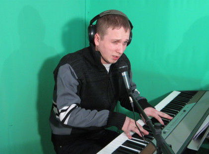 Максим Усманов